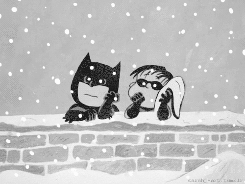 Charlie Brown and Linus dressed as Batman and Robin in the snow, as per scene from A Charlie Brown Christmas